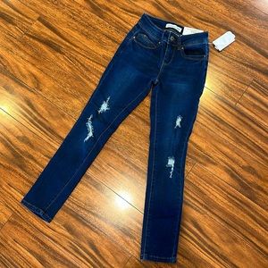 YMI skinny jeans with holes. New with tags